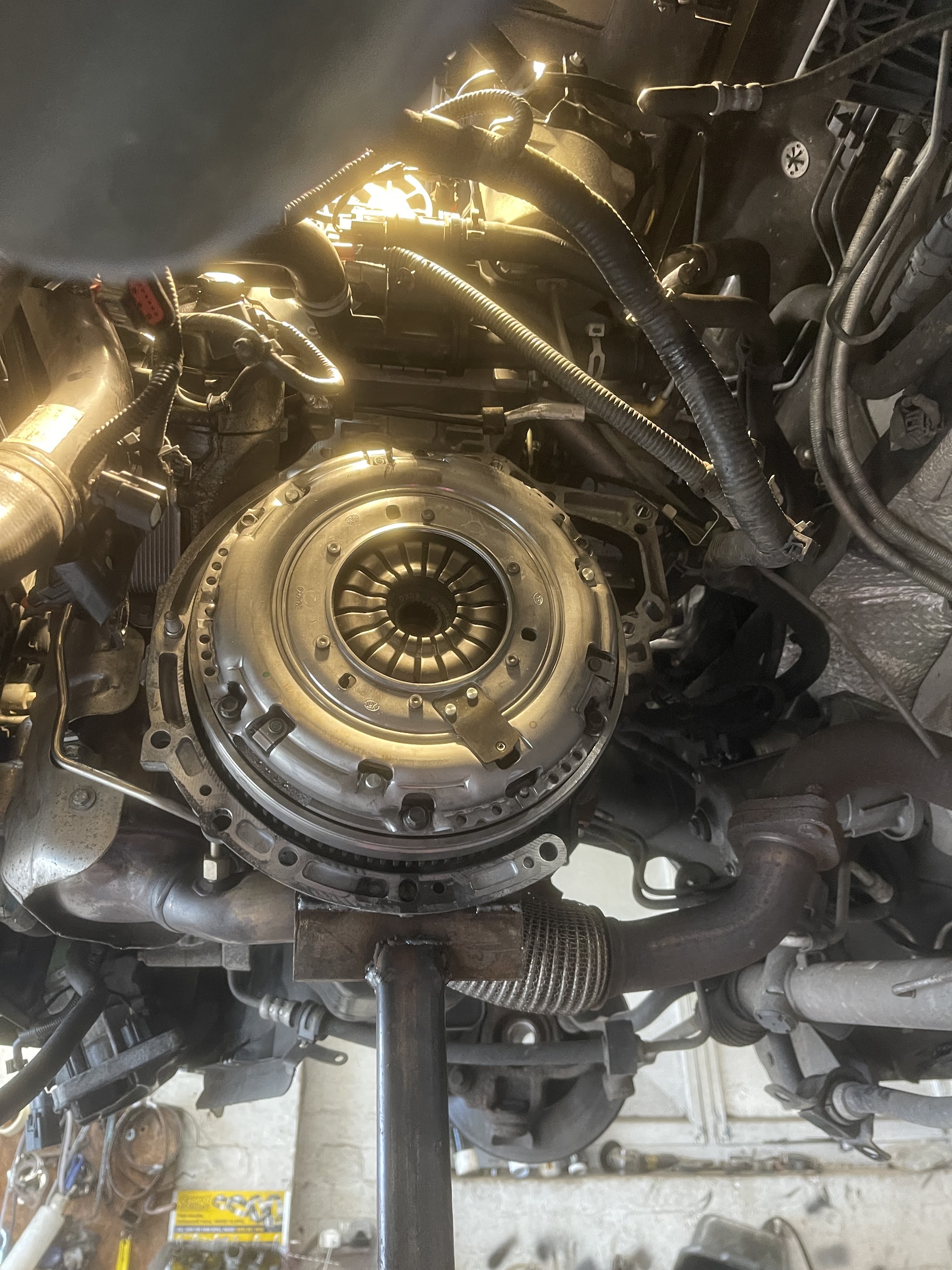 Clutch assembly fitted, seen from underneath the car on the lift